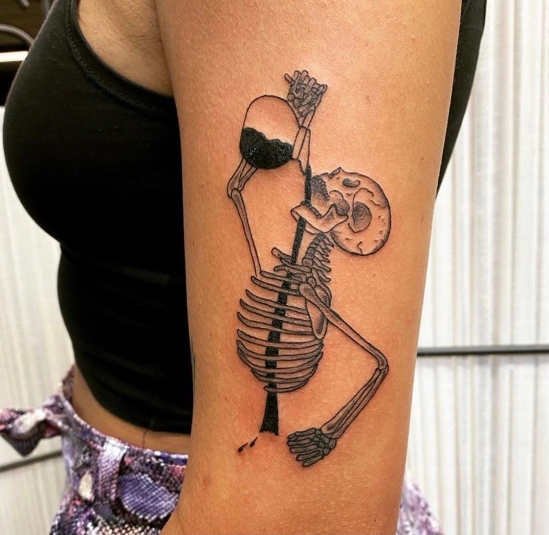 Unique skeleton coffee tattoo for caffeine lovers