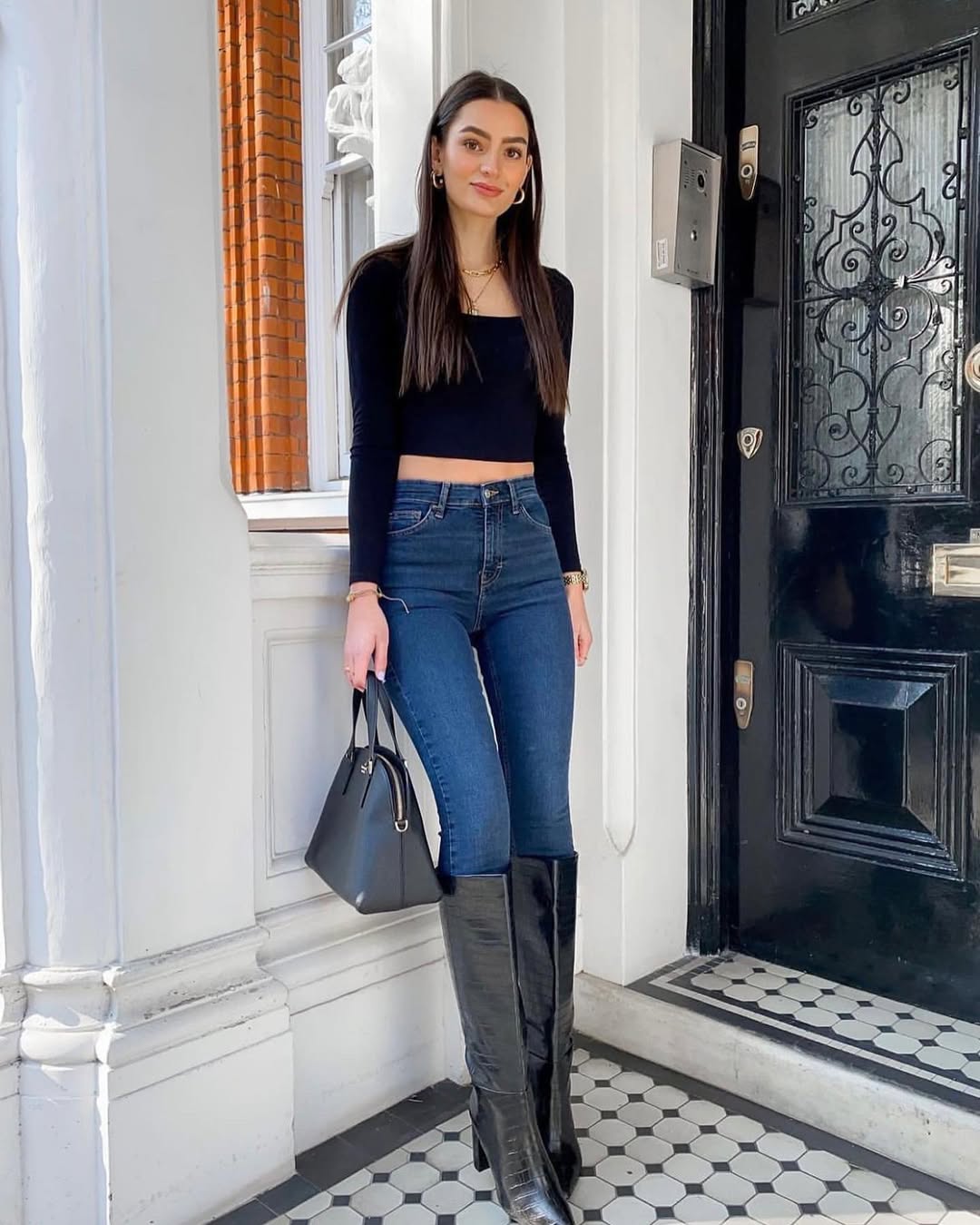 Chic outfit featuring skinny jeans and boots