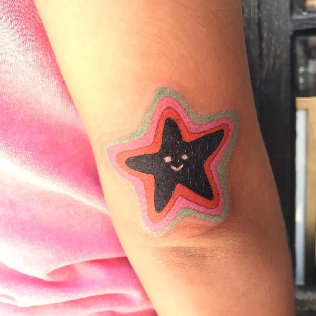 Cute and colorful star tattoo design