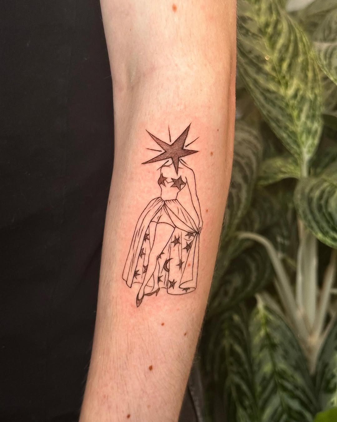 Elegant star tattoo with a unique twist