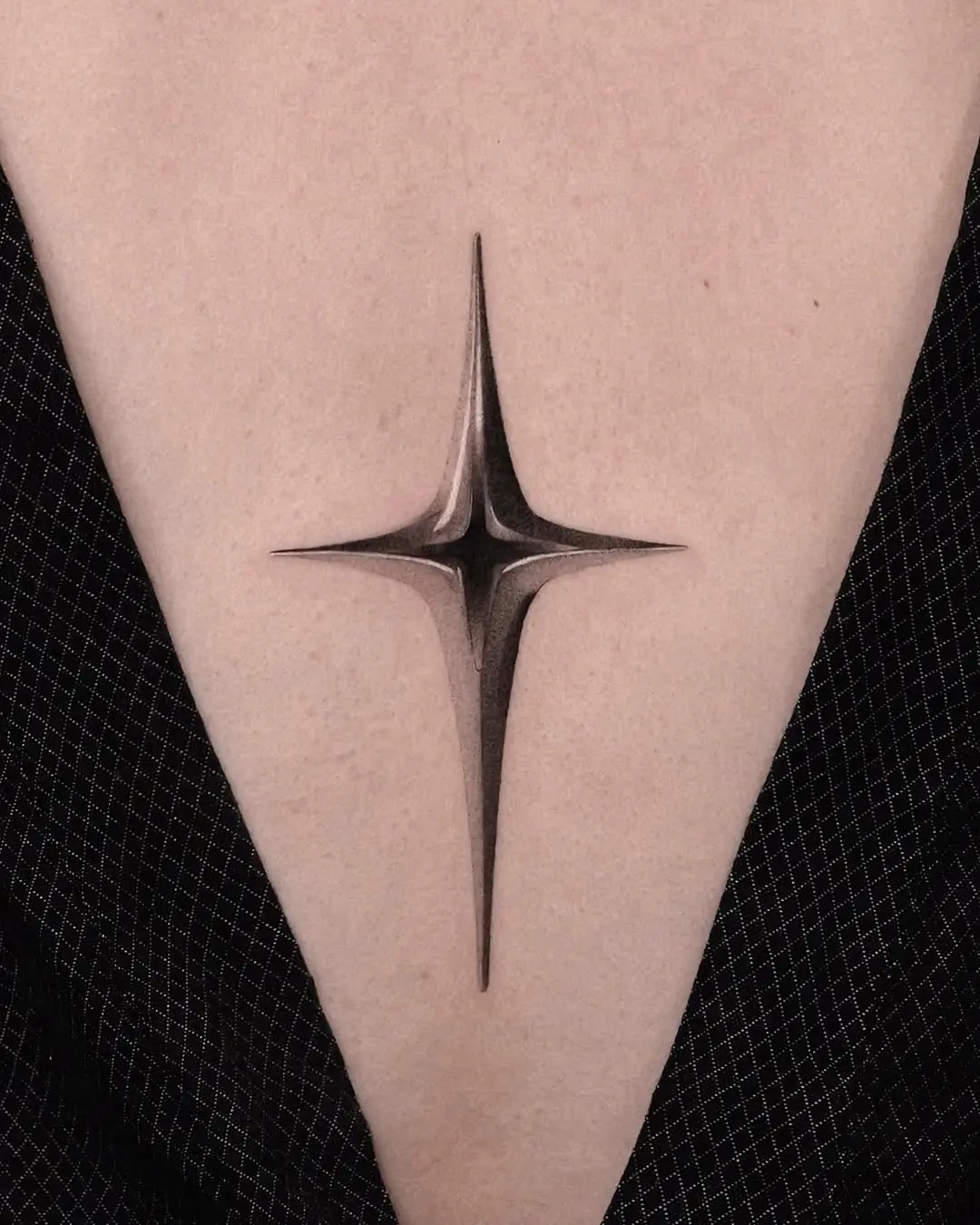 Striking star tattoo with 3D effect