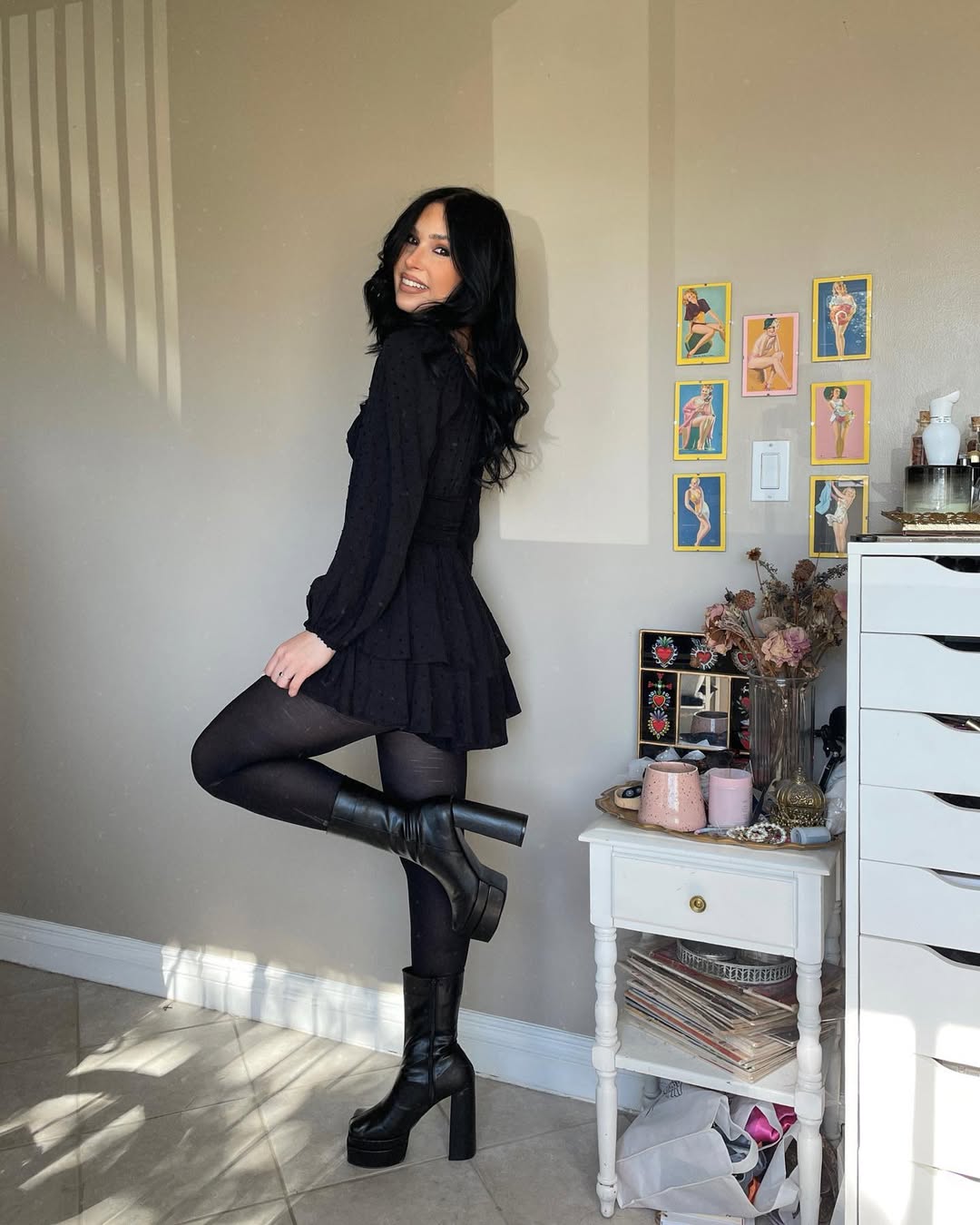 Chic black dress with bold ankle boots