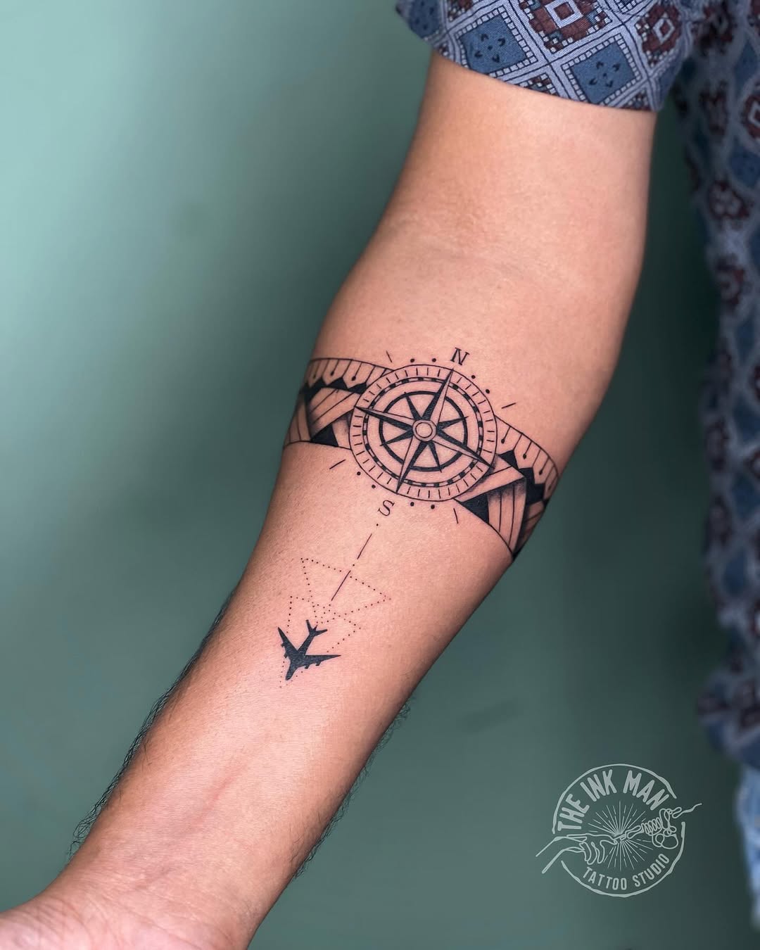 Intricate compass tattoo for wanderlust individuals