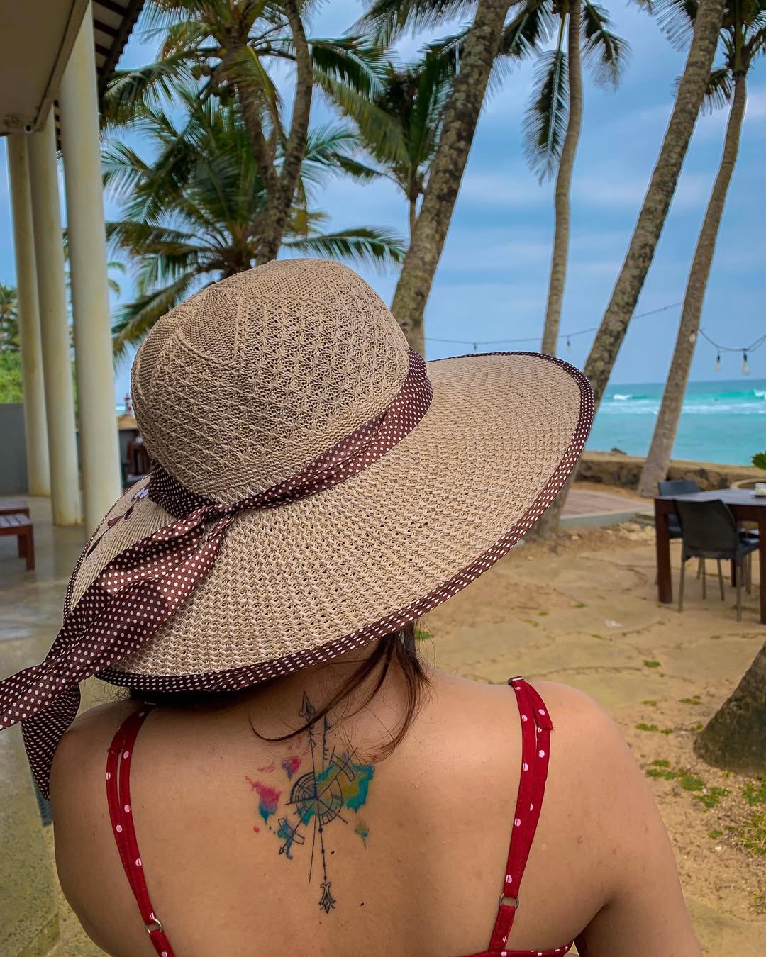 Colorful travel tattoo inspired by ocean vibes