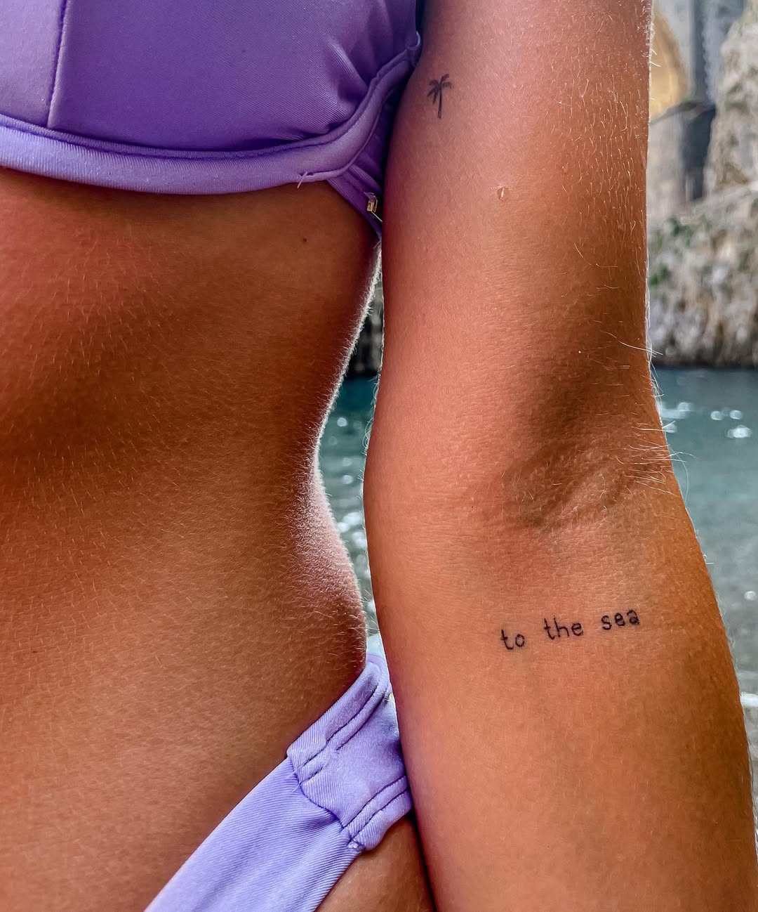 Minimalist tattoo capturing beach vibes perfectly