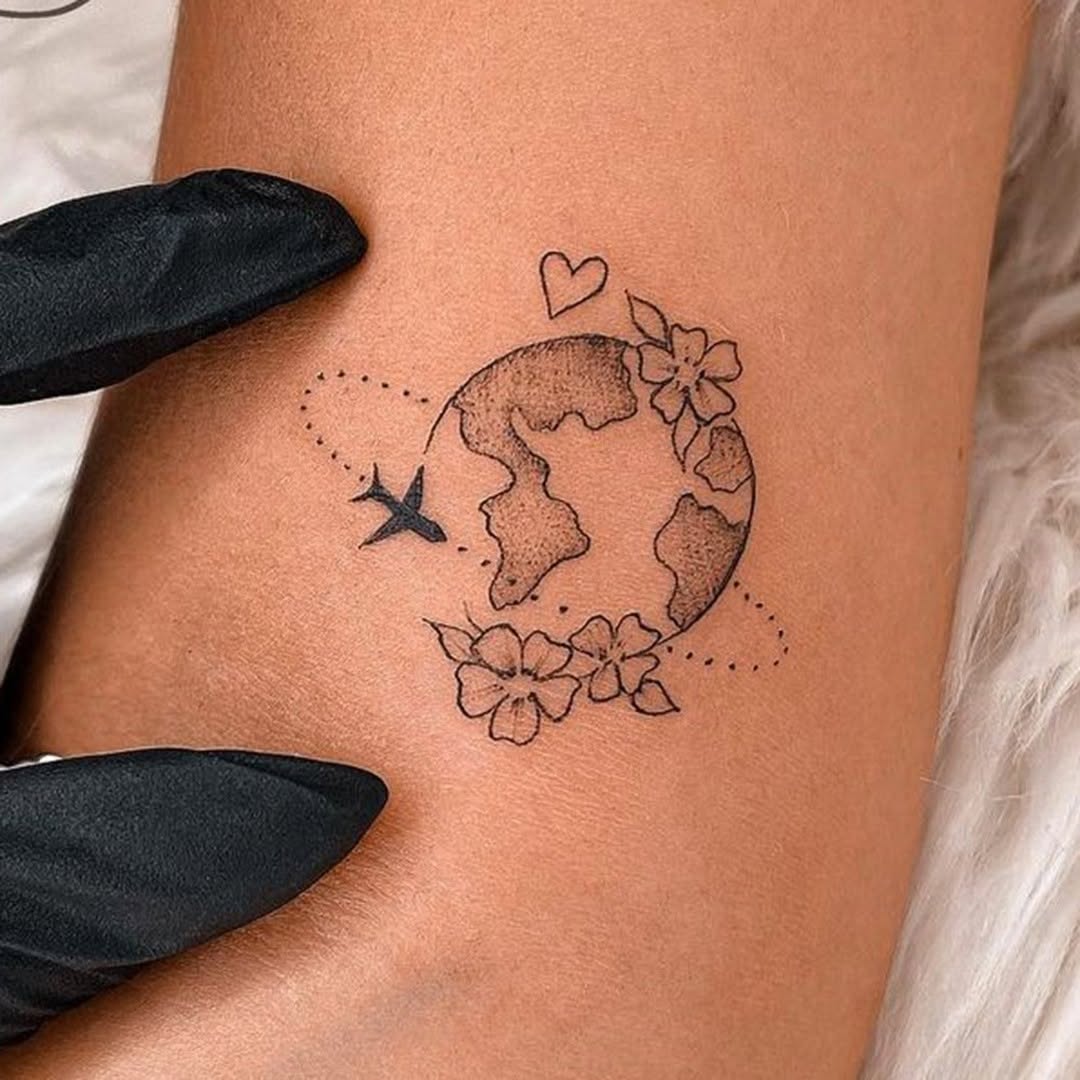 Beautiful Earth-Inspired Tattoo Celebrating Adventures