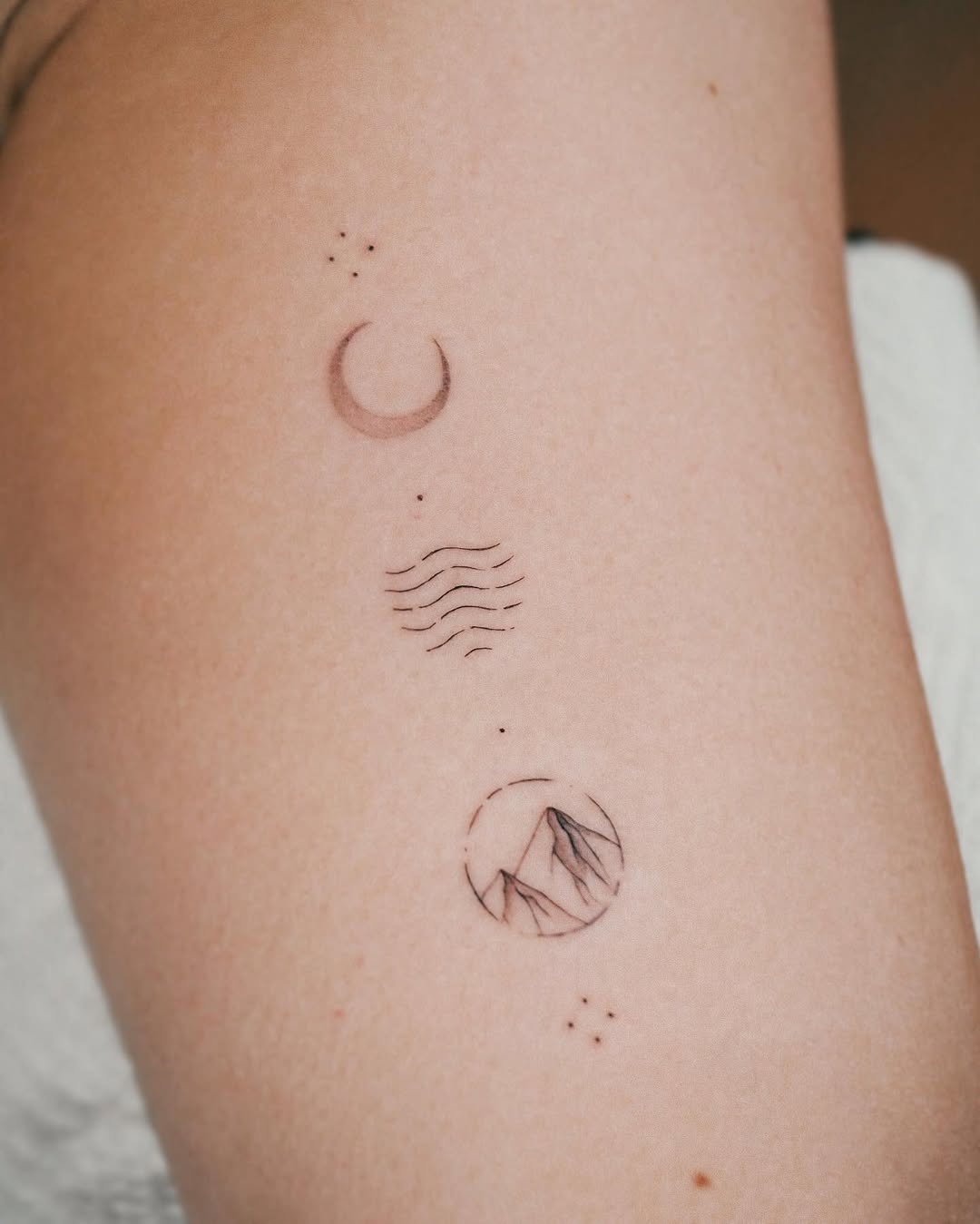 Minimalist Nature-Inspired Travel Tattoo Collection