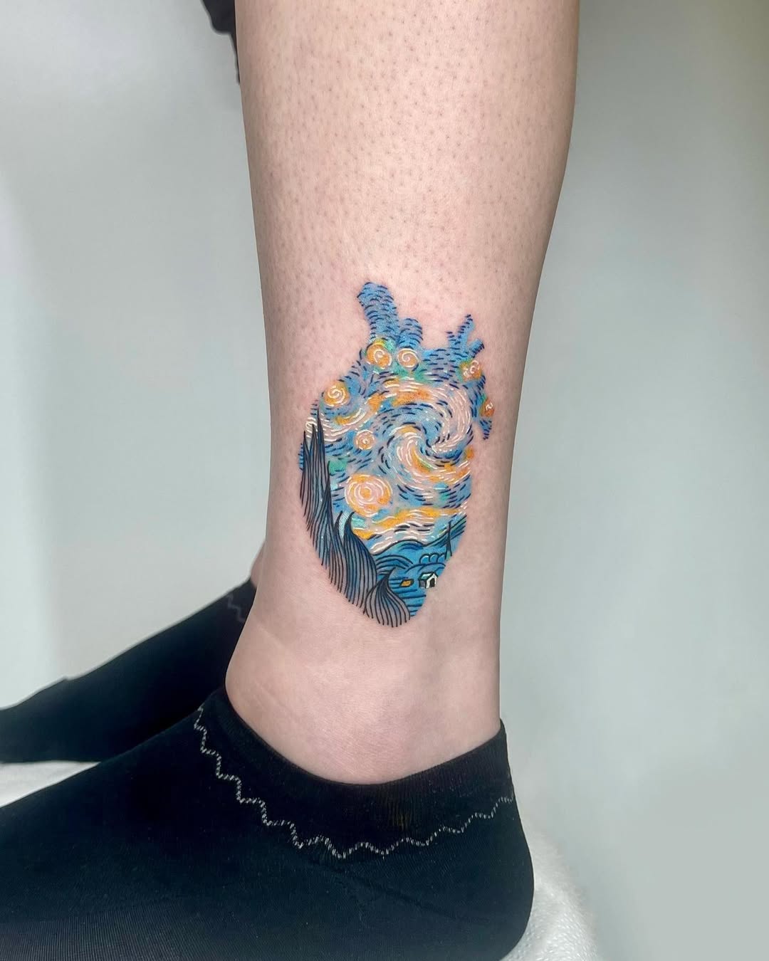 Colorful heart tattoo inspired by Van Gogh