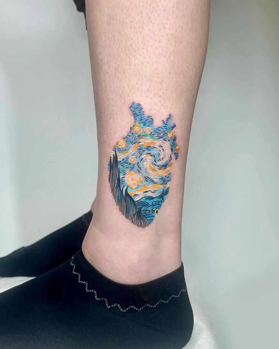 Colorful heart tattoo inspired by Van Gogh