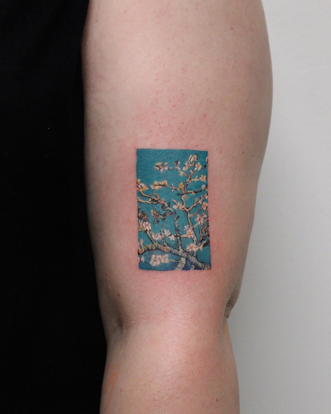 Springtime blossoms captured in tattoo art.