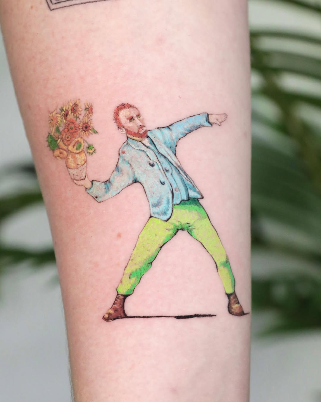 Whimsical Van Gogh tattoo with sunflowers