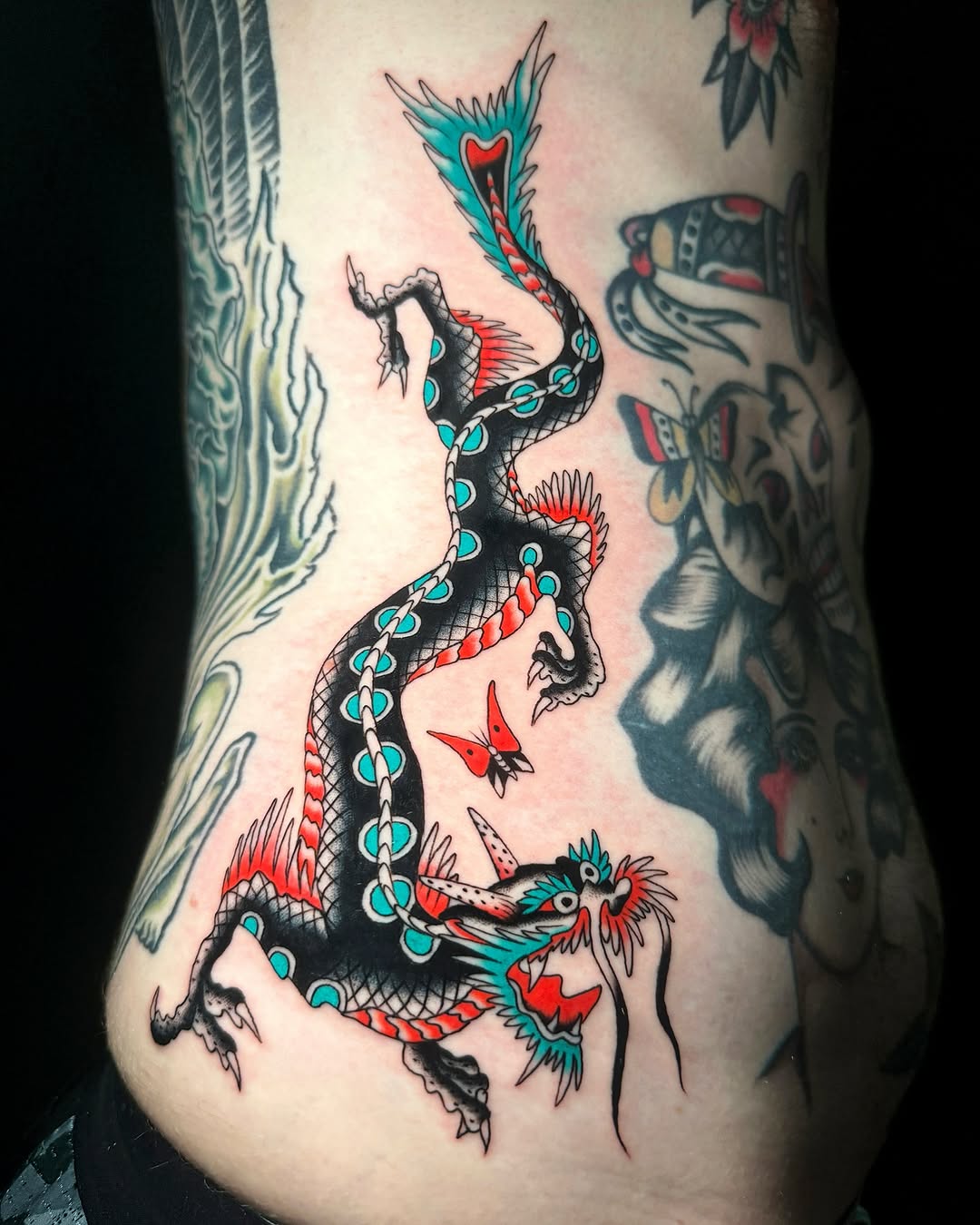 Stunning dragon tattoo with dynamic colors