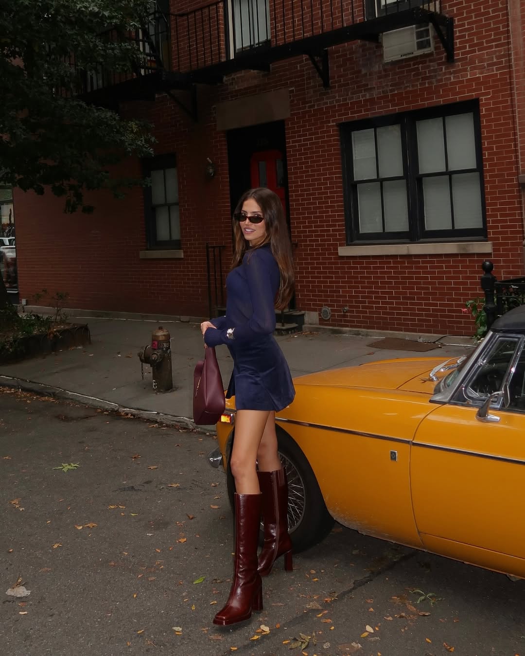 Chic street style with bold red boots