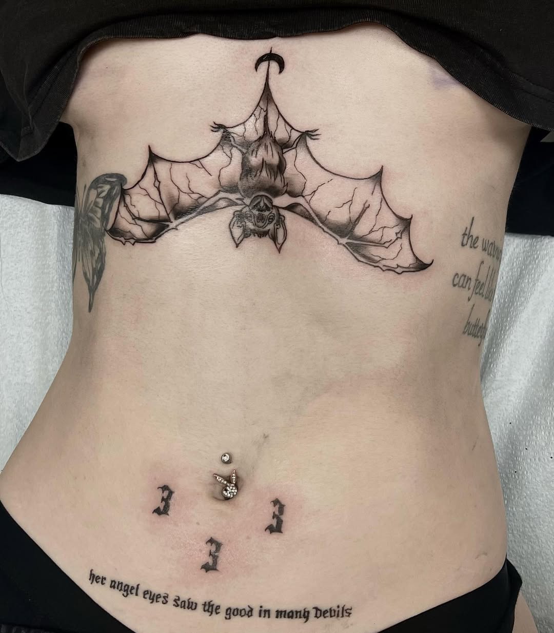 Unique bat tattoo with angel number symbolism