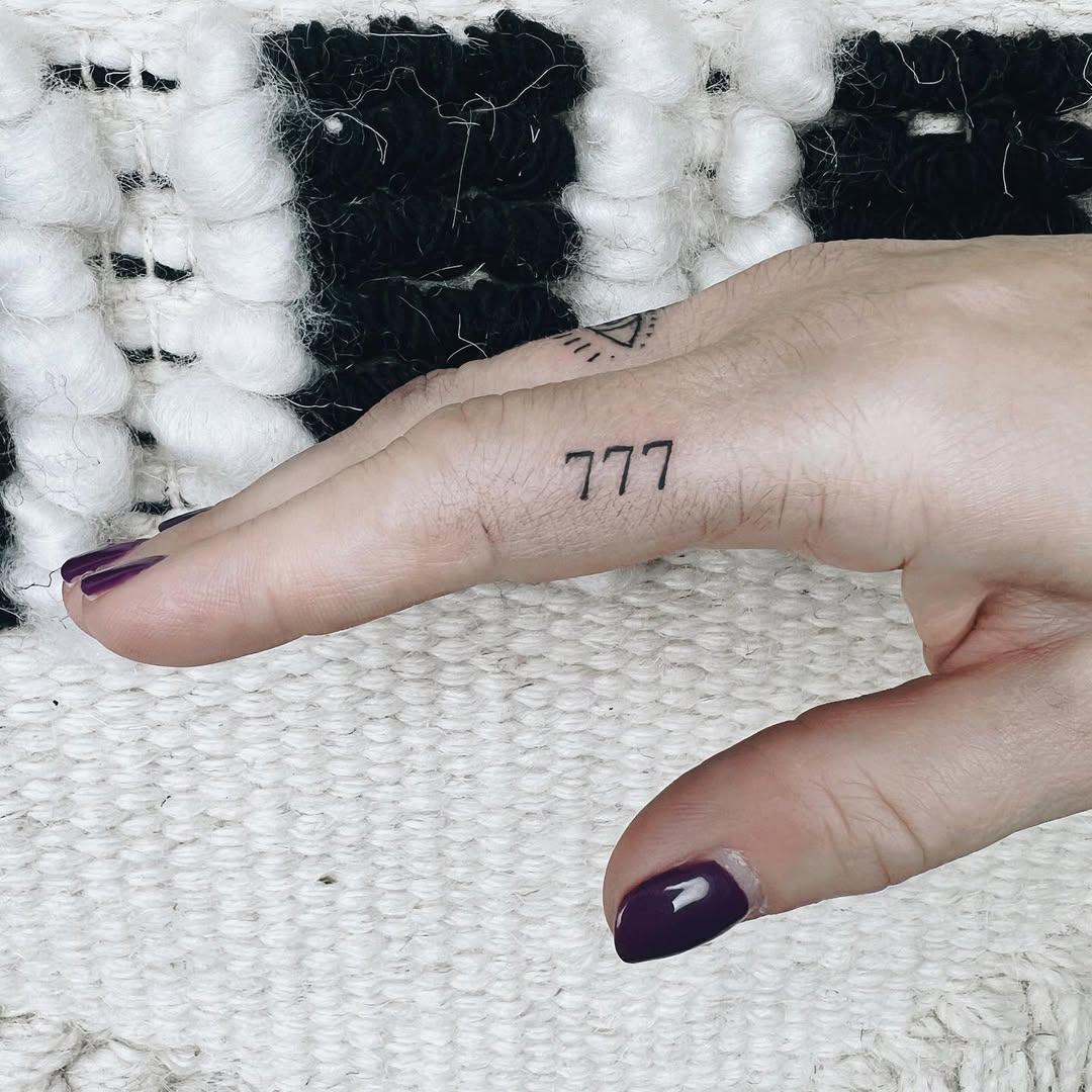 Minimalist 777 Angel Number Finger Tattoo