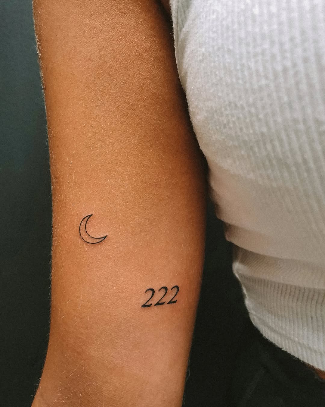 Elegant moon and 222 angel number tattoo