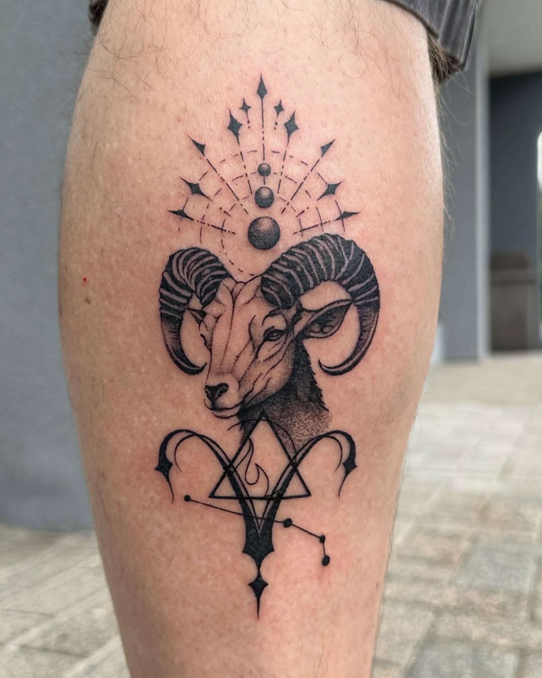 Cosmic Aries Ram Tattoo with Intricate Details