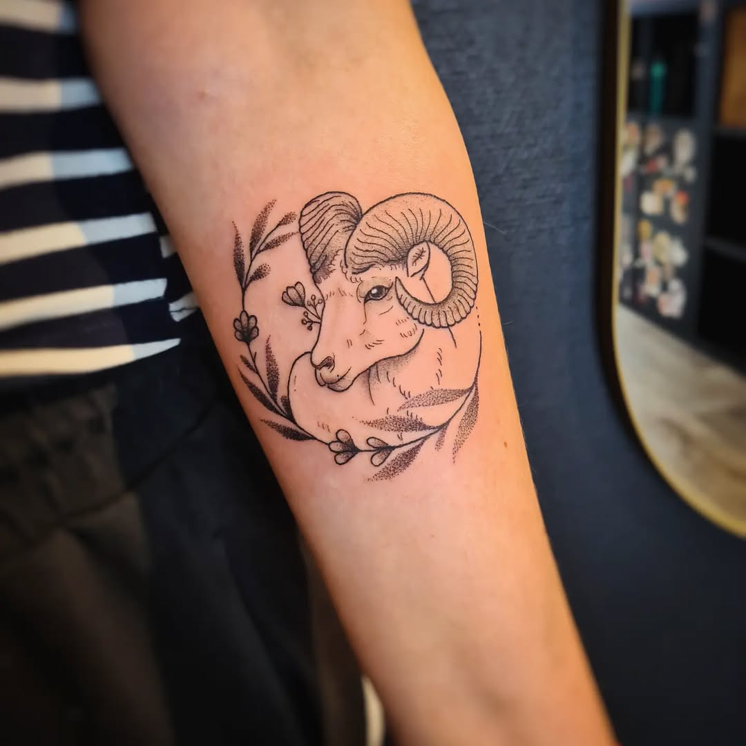 Elegant Aries Ram Tattoo with Floral Accents