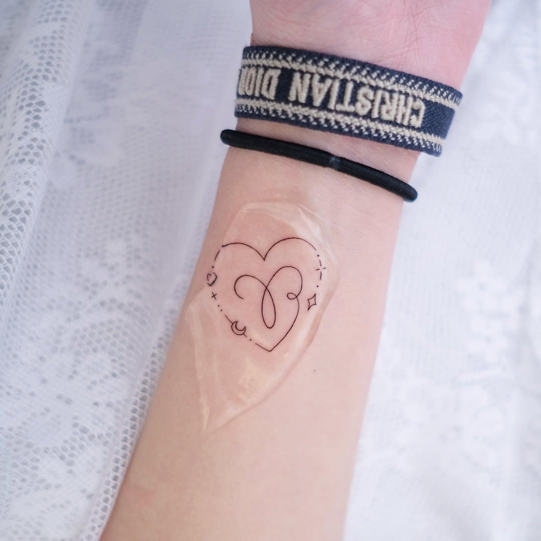 Elegant heart design tattoo for Aries