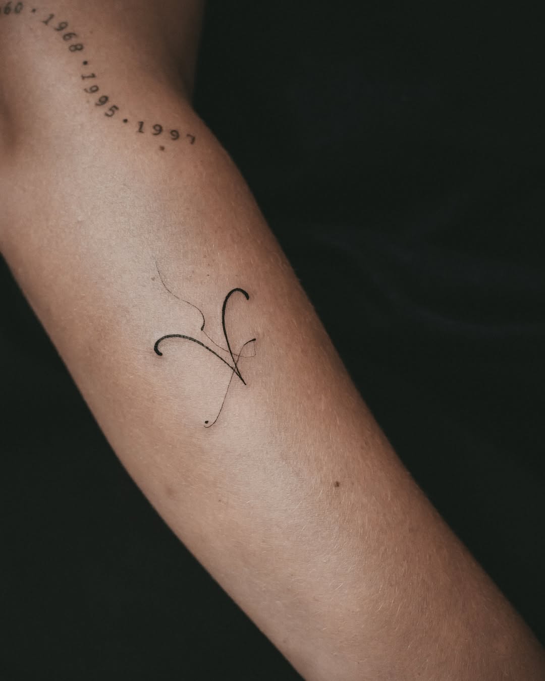 Stylish Minimalist Aries Tattoo on Arm