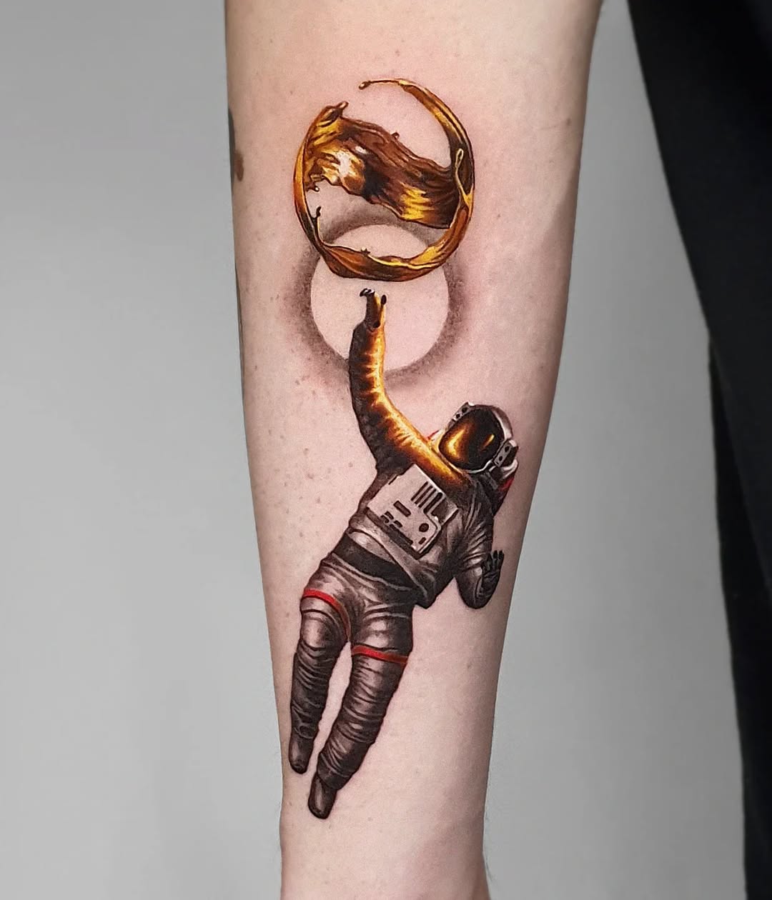 Astronaut Reaching for the Golden Moon