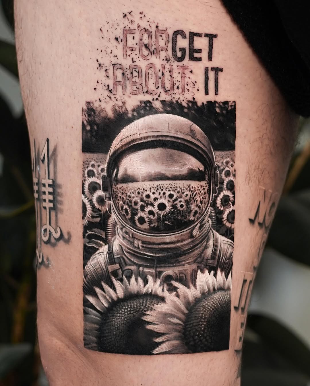 Astronaut tattoo blending nature and space themes