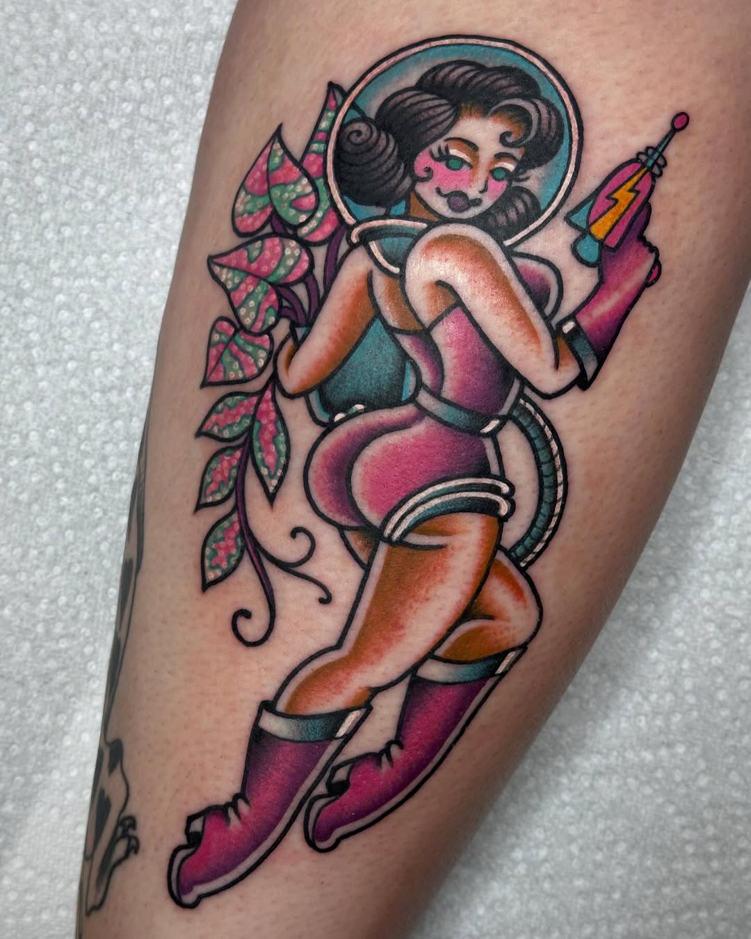 Vintage astronaut tattoo with playful vibes