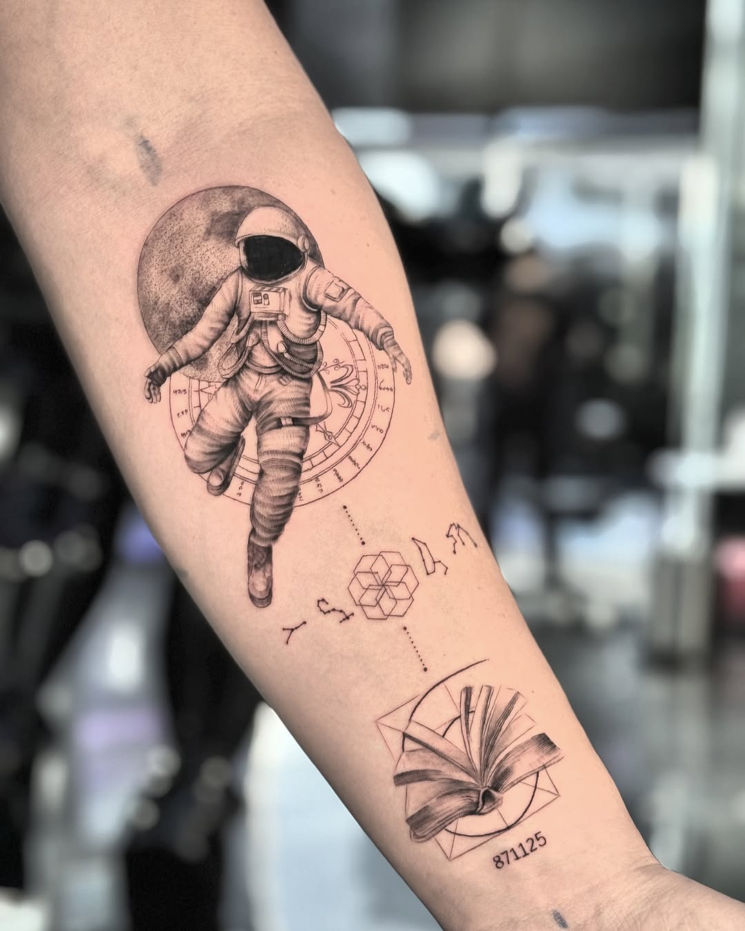 Intricate Astronaut Tattoo with Literary Vibes