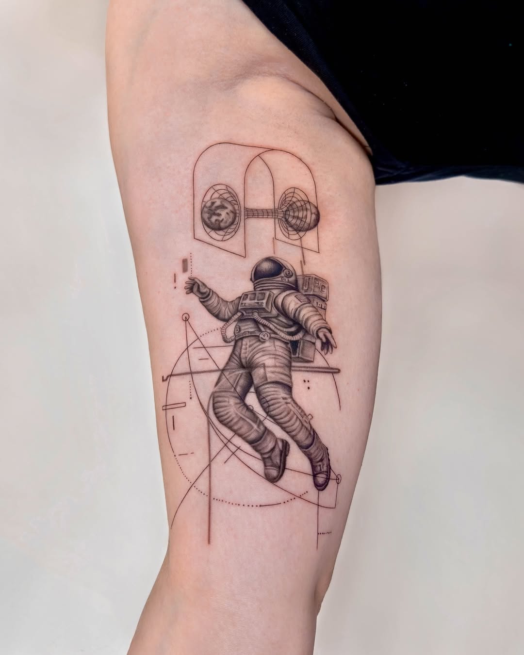 Unique astronaut tattoo celebrating space exploration