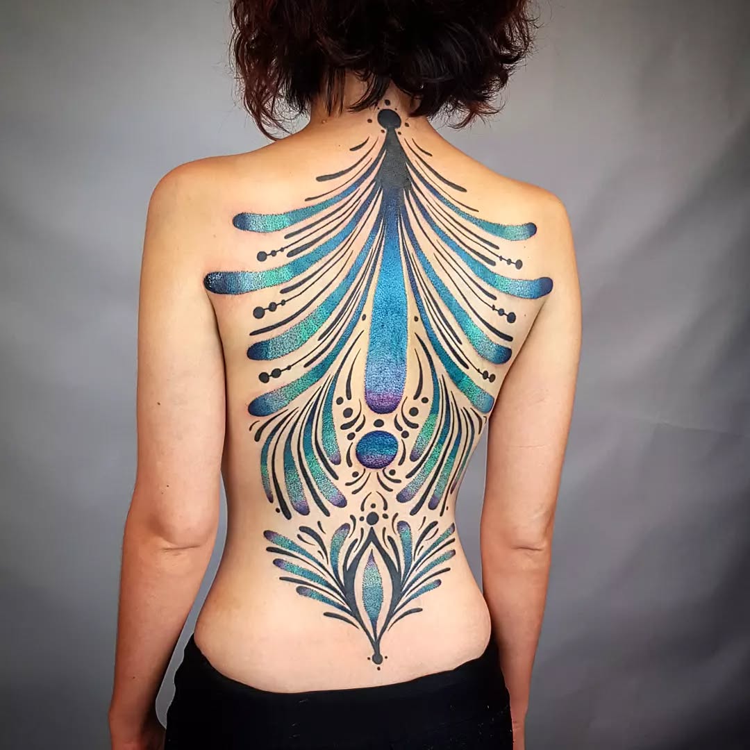 Stunning floral-inspired back tattoo design