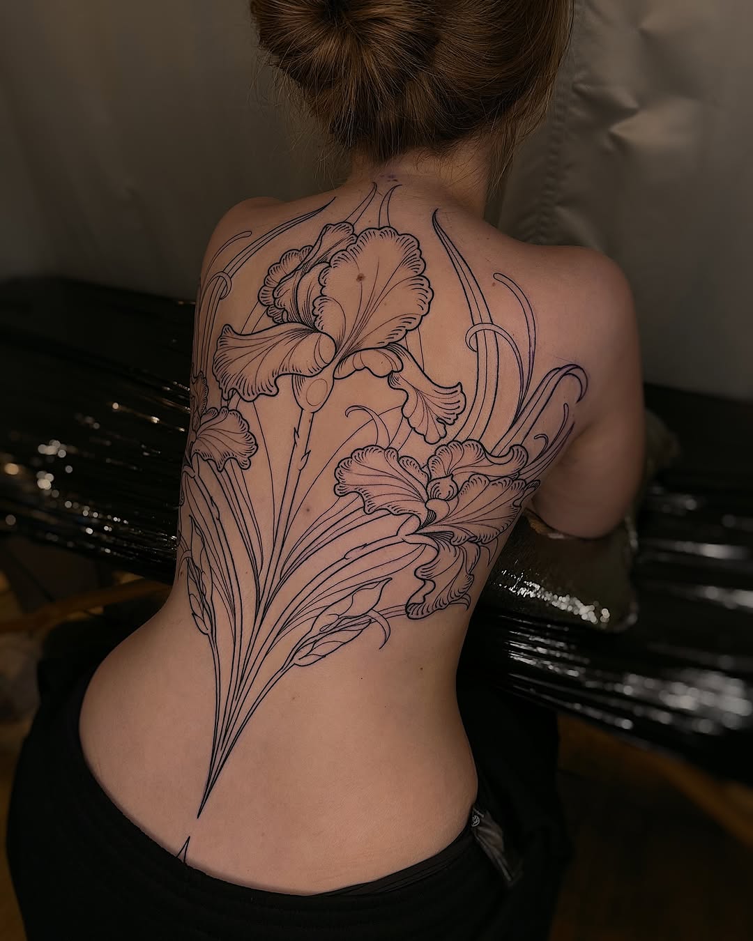 Elegant Floral Back Tattoo Design for Women