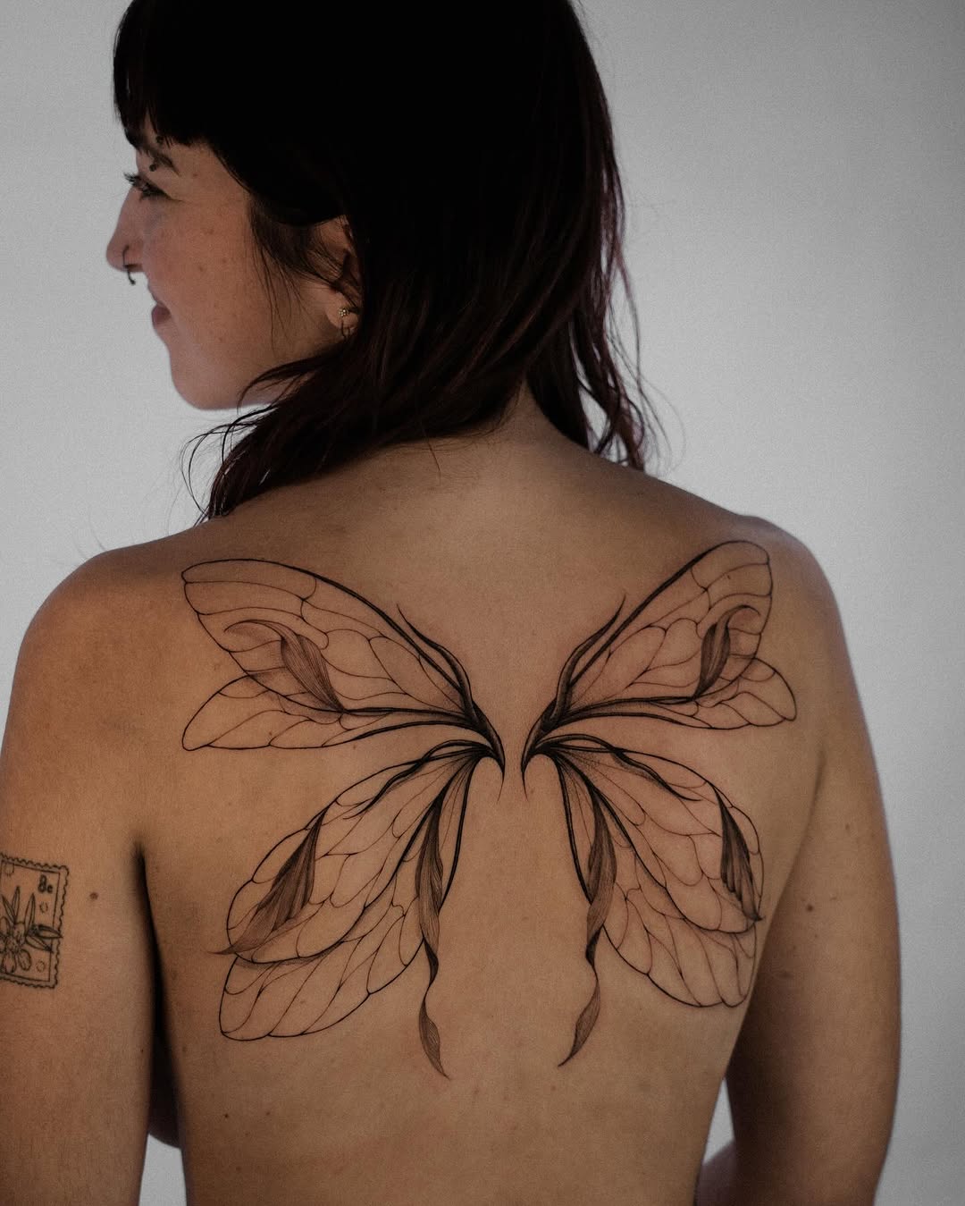 Elegant butterfly tattoos showcasing beautiful wings