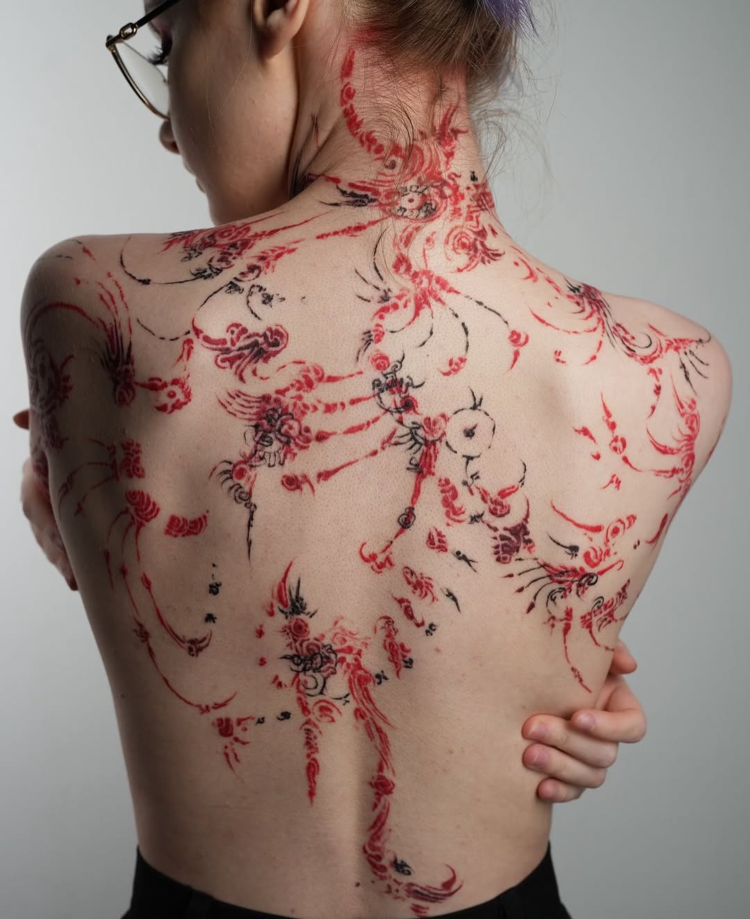 Intricate Floral Back Tattoo Design for Women