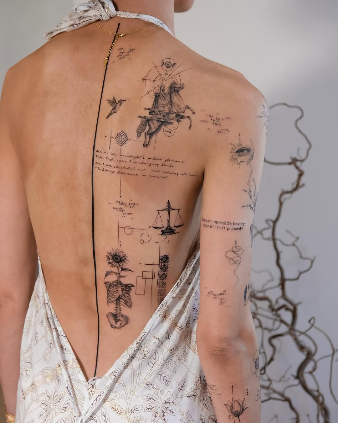 Elegant mix of symbols and artistry on skin