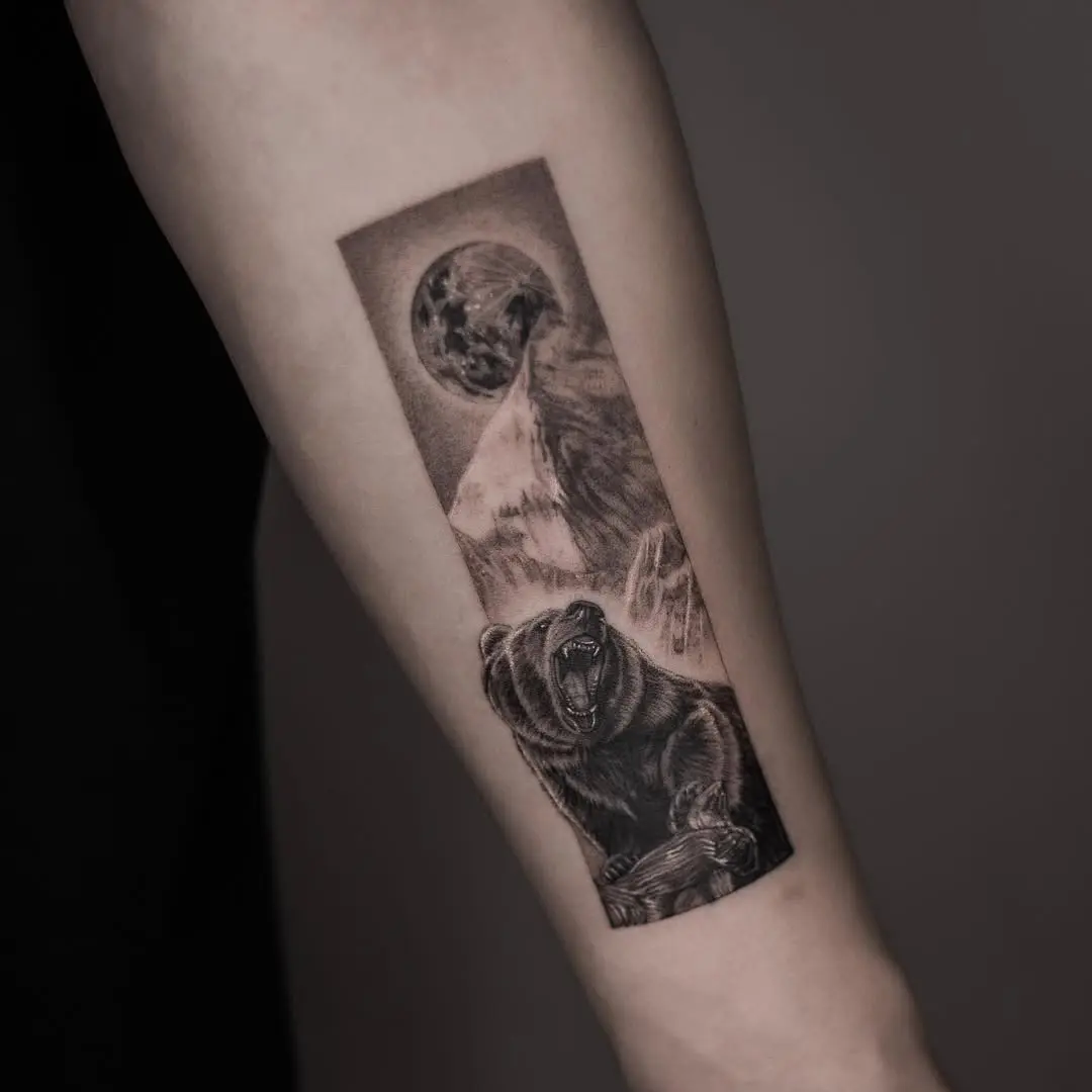 Majestic bear tattoo with mountain scenery