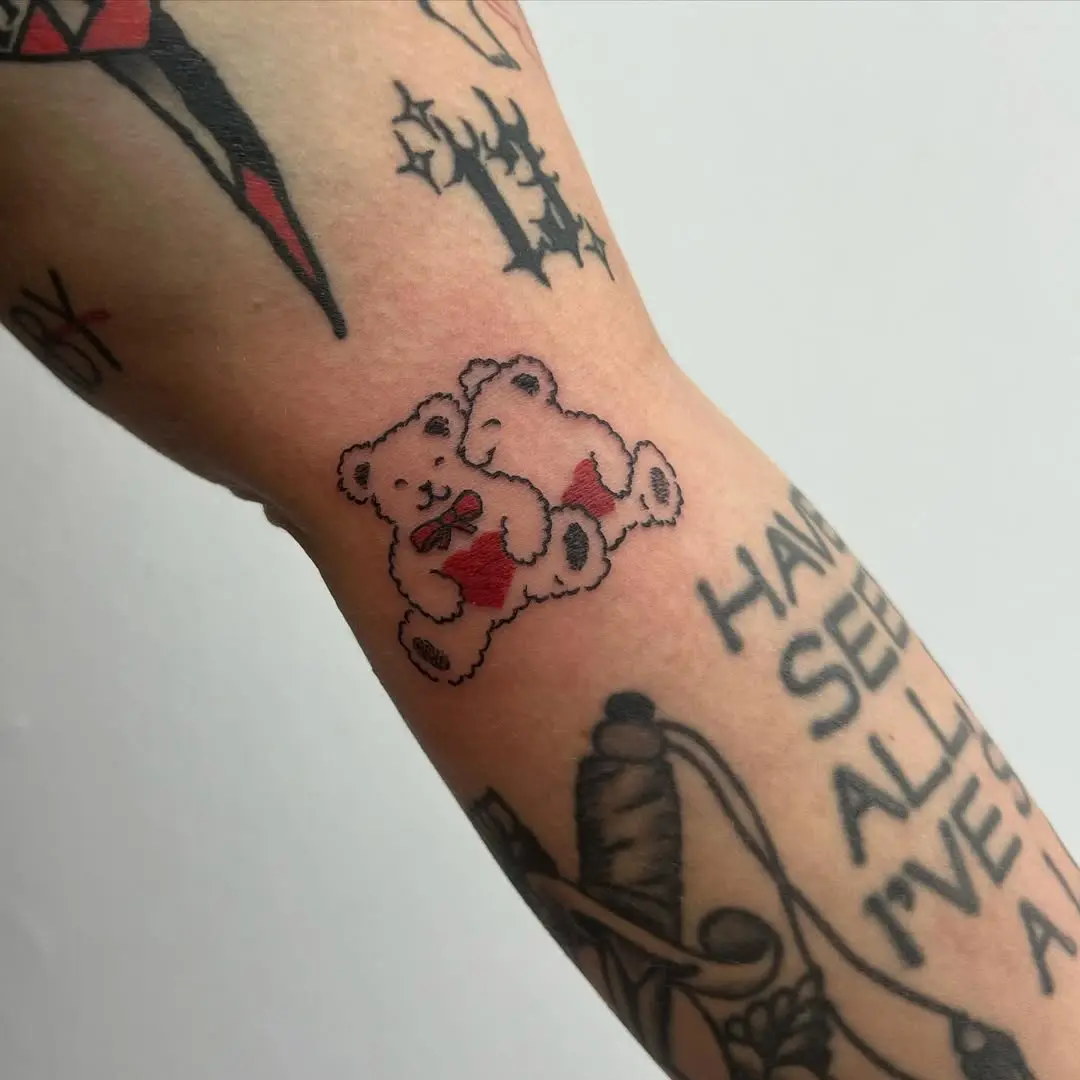 Adorable pair of teddy bear tattoos