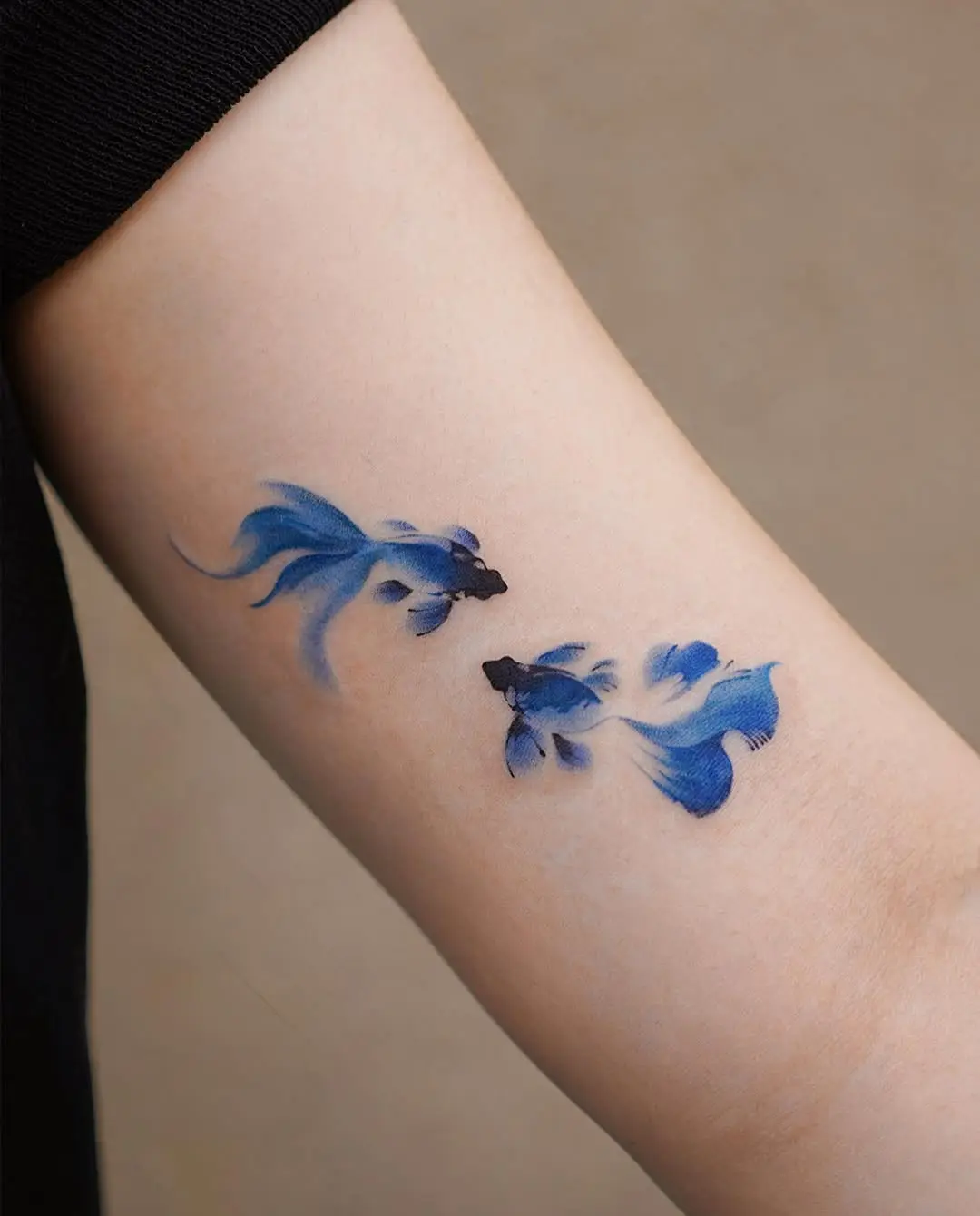 Elegant blue koi fish tattoo design