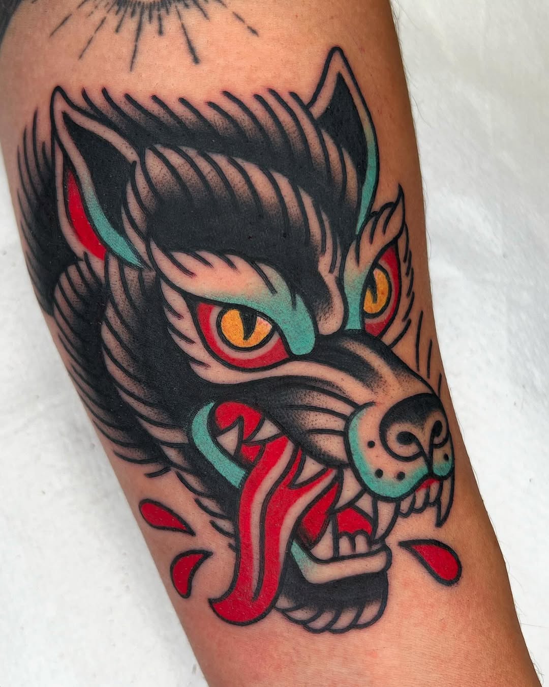 Vibrant and fierce wolf tattoo inspiration