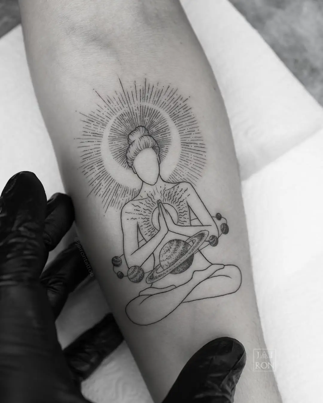 Elegant Buddha Yoga Tattoo with Cosmic Elements