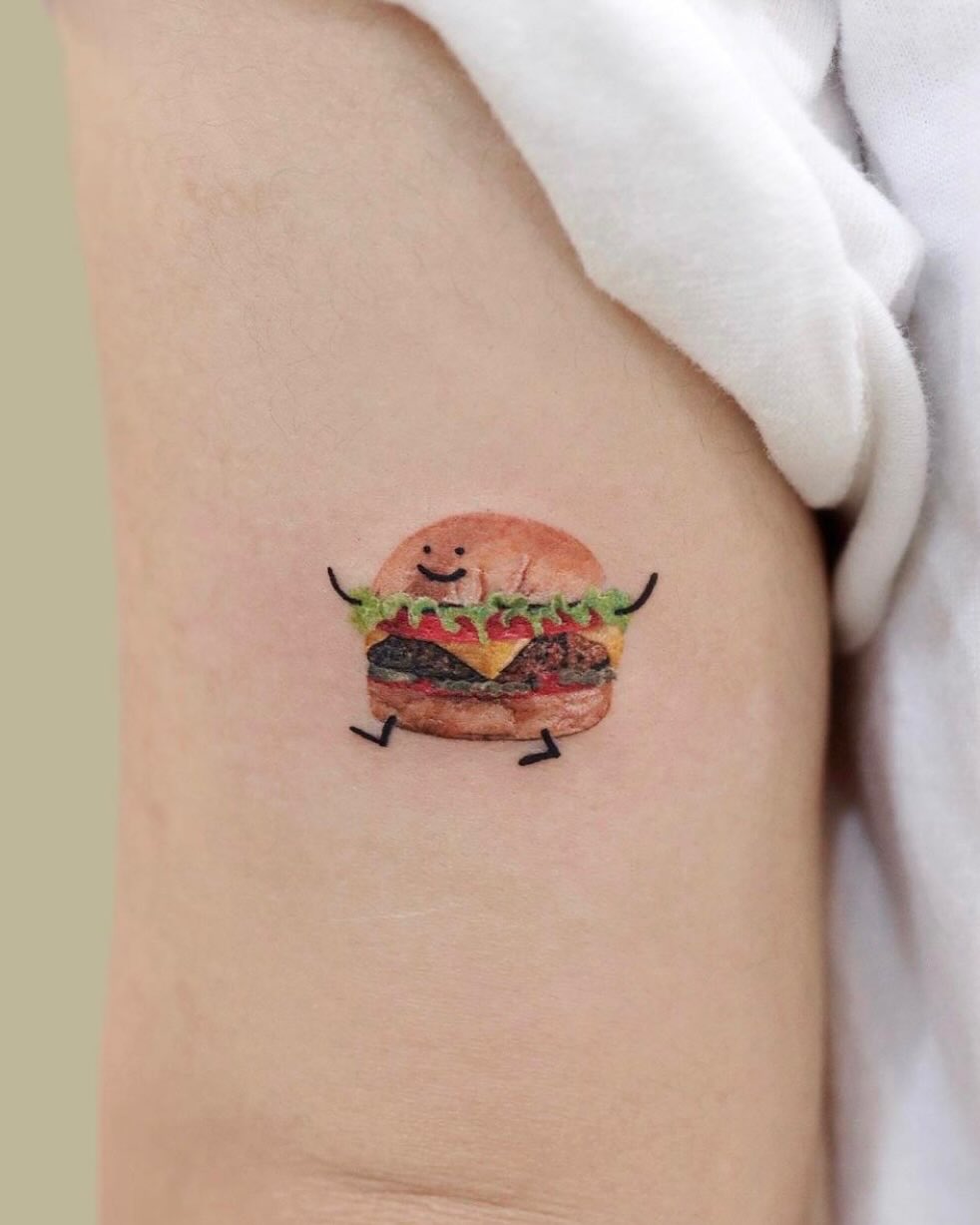 Whimsical burger tattoo with a playful vibe