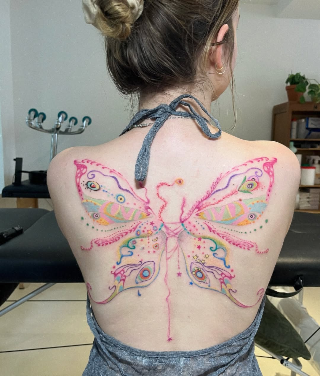 Vibrant butterfly tattoo showcasing feminine elegance