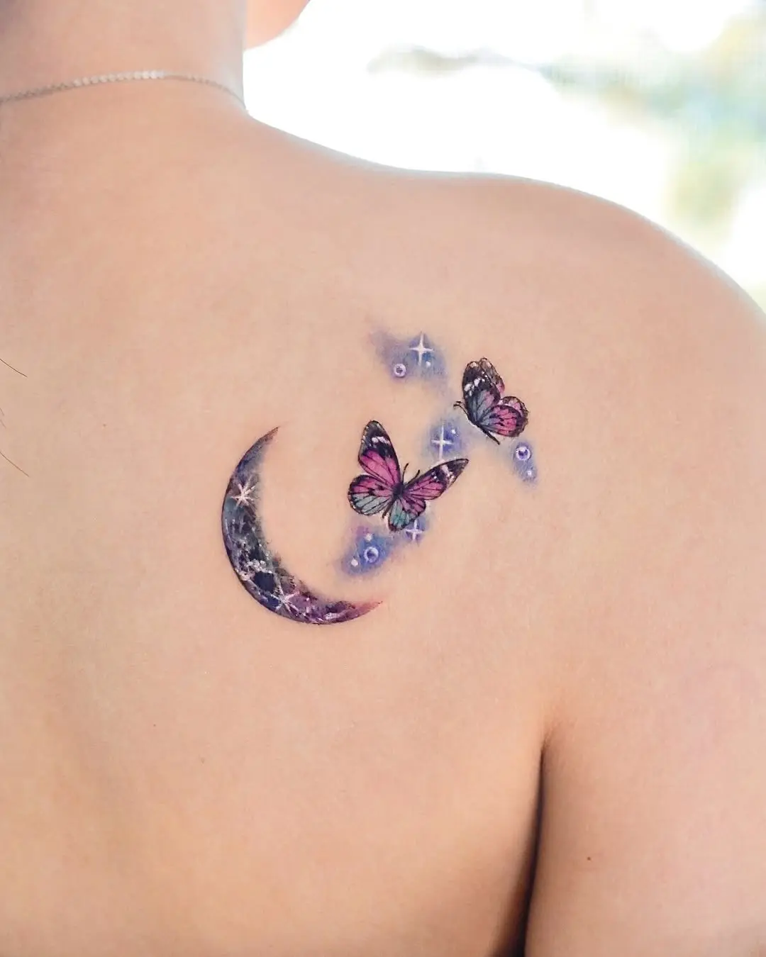 Whimsical butterflies with a crescent moon