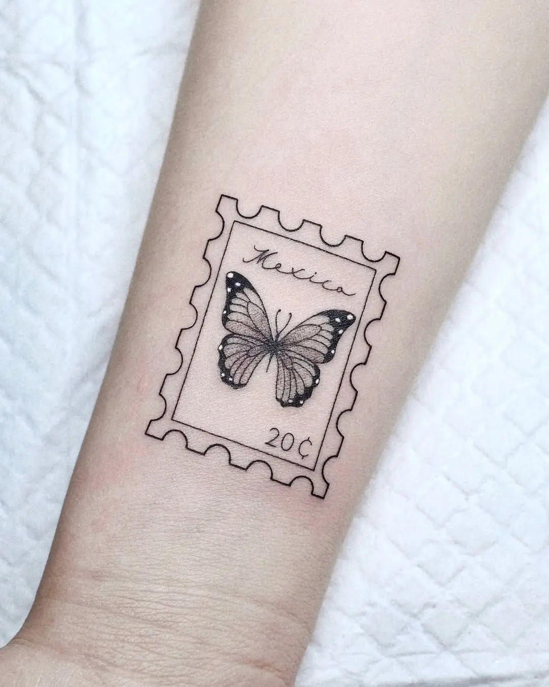Unique Butterfly Tattoo in Stamp Design