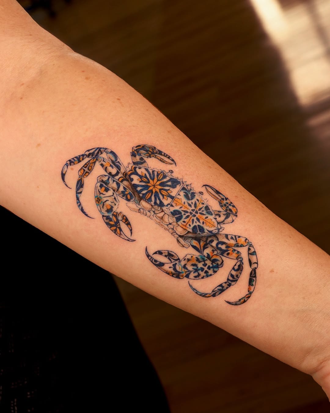 Vibrant cancer zodiac crab tattoo design