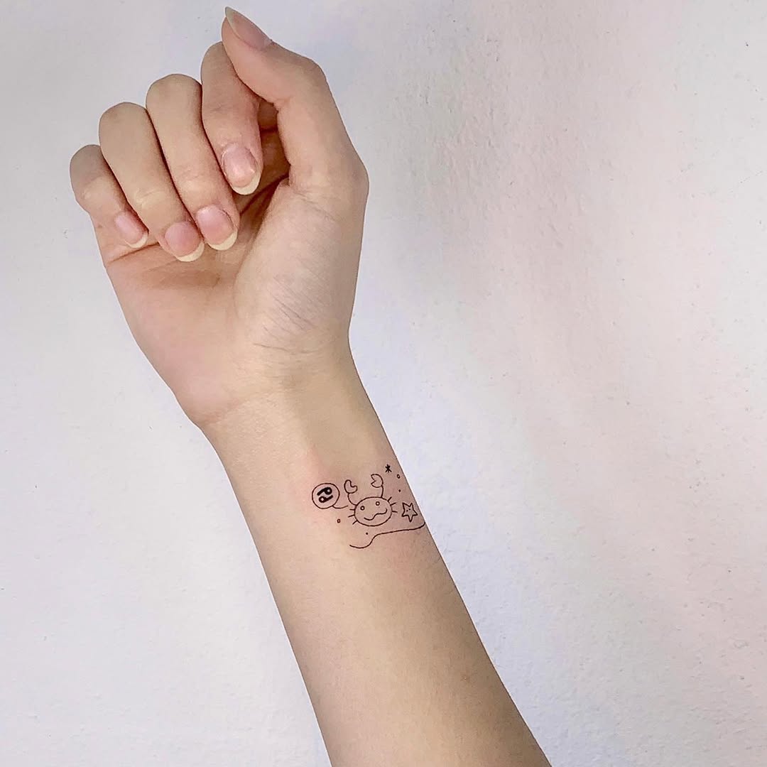 Charming Cancer Zodiac Tattoo Design on Wrist