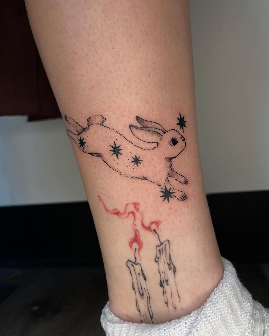 Whimsical rabbit tattoo reflecting Cancer vibes