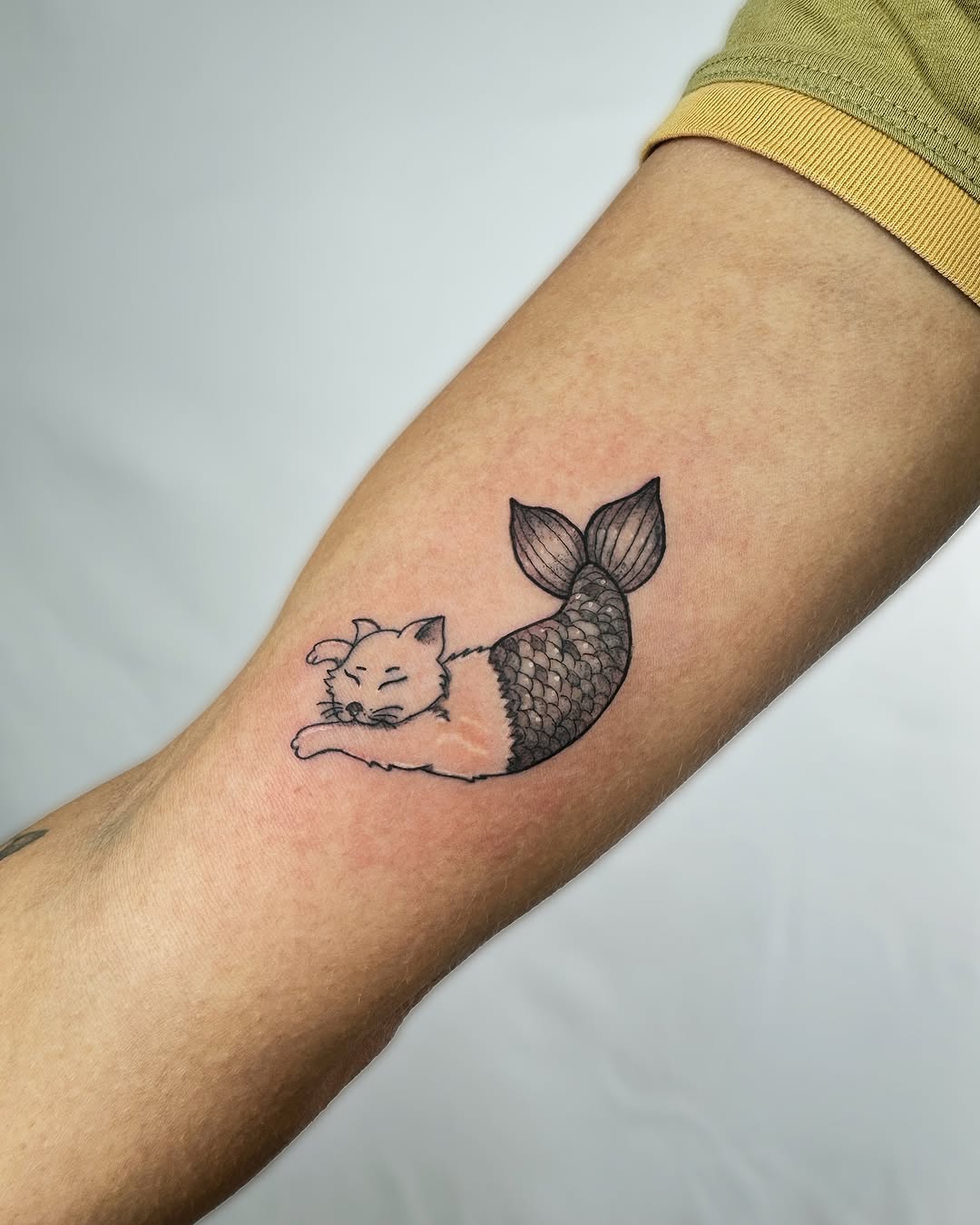 Whimsical Cat Mermaid Tattoo Design