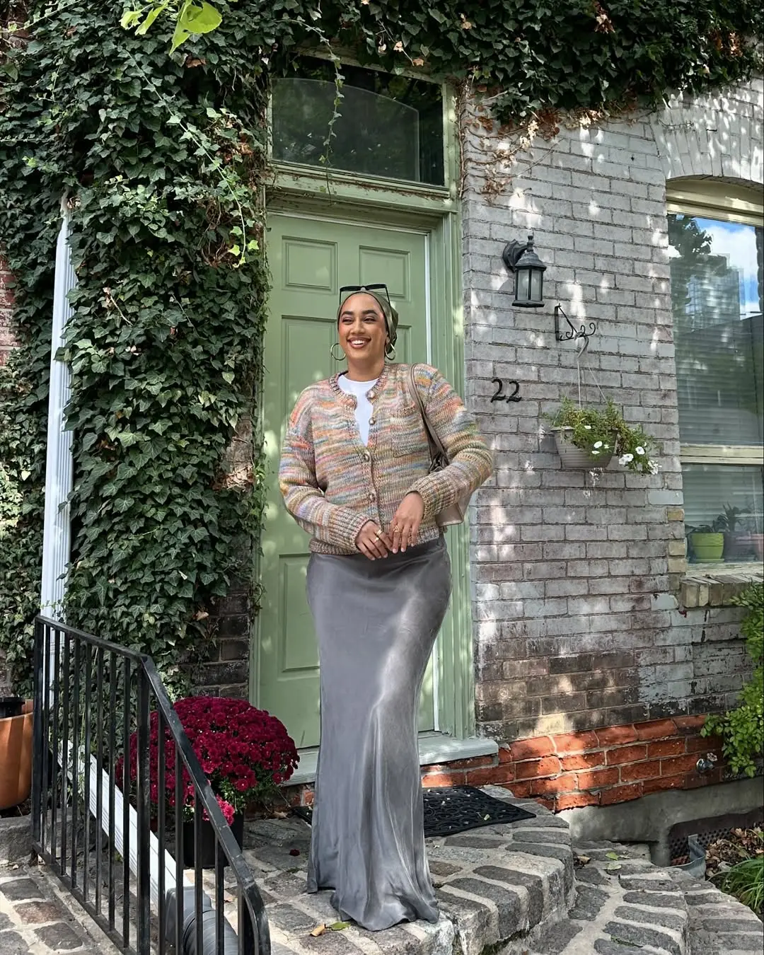 Effortlessly chic cardigan over a flowing skirt