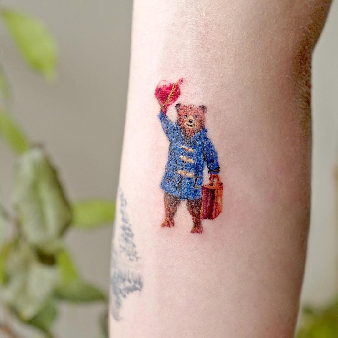 Charming bear tattoo in vibrant colors