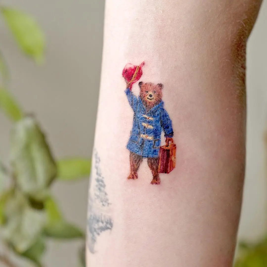 Charming bear tattoo in vibrant colors